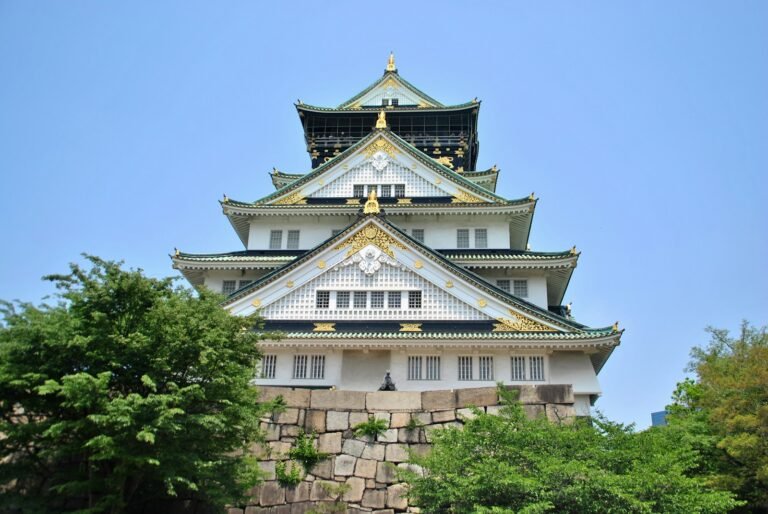 white and green temple under blue sky during daytime